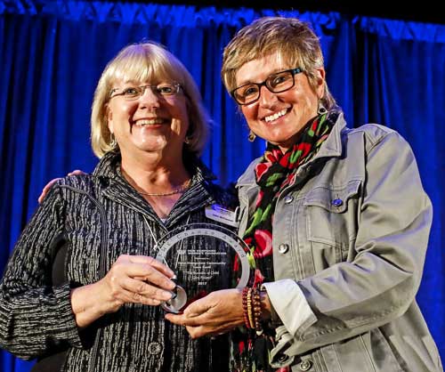 Julie McConnell receives the first SHE Change award